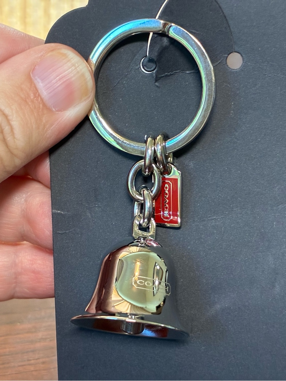 Coach Silver Bell Bag Charm